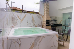 Casa 4 suítes com hidromassagem